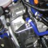 <p>This cover fits snugly over the plastic charcoal canister at the front left of the engine bay