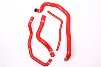 together with the upper and lower header tank hoses (the lower hose is in two pieces from Ford