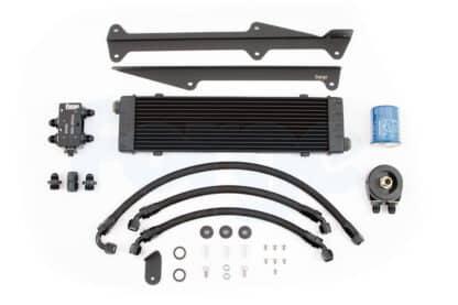 &lt;p&gt;Sitting in full air flow and mounted correctly with the oil flowing into the top of the oil cooler and exiting though the lower outlet