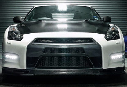 <p>Additional air ducting designed to increase the amount of air and cooling on the Nissan GTR35. This lightweight carbon <gwmw class="ginger-module-highlighter-mistake-type-1" id="gwmw-15479028639321142442699">fibre</gwmw> scoop is complemented with a reinforced and <gwmw class="ginger-module-highlighter-mistake-type-1" id="gwmw-15479028639326416845393">ducted</gwmw> replacement alloy crash bar. Registration plate mountings are supplied for those who want a road to track removal option.</p>