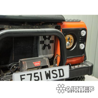 efficiency and volume over standard. It is also a direct replacement for the smaller and more restrictive OEM set up yet still fits neatly beside the standard radiator