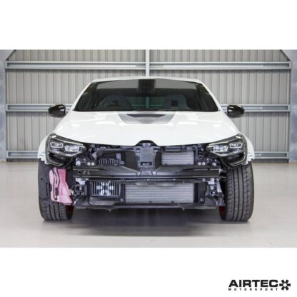 the radiator took president and a small but deep intercooler was located off to the left-hand side.This presented issues in developing a larger intercooler