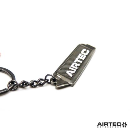AIRTEC Motorsport double-sided intercooler key ring.Finished in gloss black with a distinctive AIRTEC logo in white and made from metal