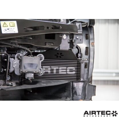 external oil cooler neatly behind the bumper where it could still benefit from direct air flow