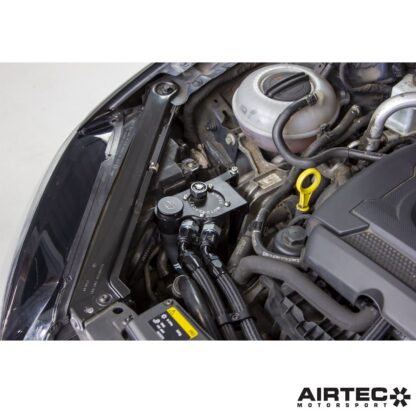 which allows the catch can to attach neatly in place and also locates the new washer fluid tank filler.The can itself features an internal micron filter