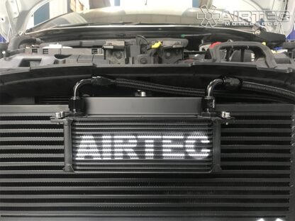 making every part of our AIRTEC Motorsport oil cooler kit unique and finished to a stunning level of quality.Grill mounted to achieve maximum cold airflow and fits either side of grill as not to affect cold air feed for air filters.Kit Includes.13 row high performance AIRTEC motorsport oil coolerAeroquip 90 degree Black anodised fittings with Black Pro-Lite Oil hoseBillets anodised Black hose line separators x 4Gearbox mounted hose securing bracket finished in ProSeries BlackDesigned to fit with AIRTEC stage 3 intercooler & supplied with a bracket for cars running standard or other aftermarket intercooler!Today s high performance vehicles pack a lot of power in a smaller package.In order to save both weight and space