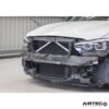 using the OEM mounts and the original coolant connectors. To protect the larger core in its vulnerable position at the front of the car