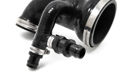 we removed the chamber allowing us to increase the volume and air flow significantly. Our hose design also has an internal stepped area where it is positioned and joined to the turbo housing