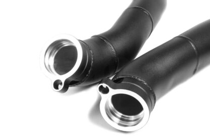 which have been known to fail with cracks forming along the plastic welded section between the main tube and plastic coupler. Manufactured in 60mm diameter Aluminium tube with CNC machined couplers. To ensure an OEM quality fit both hardpipes have been carefully contoured to fit in the restricted space between the engine and chassis. No further modifications are necessary to the bodywork or pipework.</p>