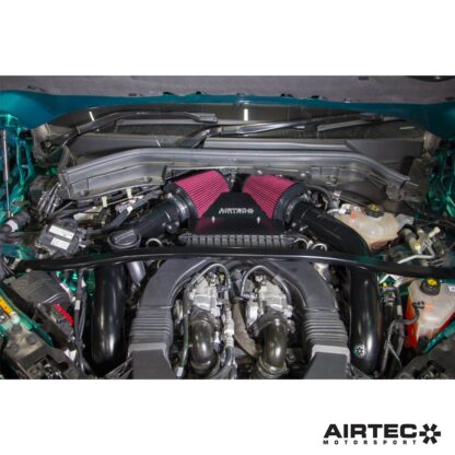 shared air box that is mounted within the engine's Vee formation and is supplied fresh air through feeds from the front grille. The intake pipes then feed back towards the front of the car and into the turbo inlets. This routing creates various restrictions along the way as the pipes make are not straight and pinch in at points.The Solution  Developed in-house at AIRTEC HQ in the UK