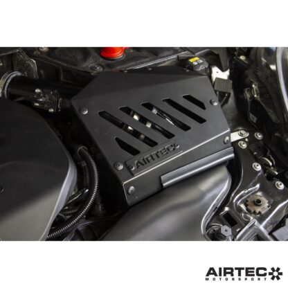 free-flowing cotton air filter housed inside a three-piece enclosure