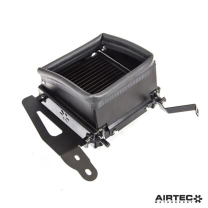 oil temperatures reached 123 degrees. We needed to address the car's entire cooling system if we were going continue to modify and track our Yaris.The solutionDeveloped in-house at AIRTEC HQ in the UK we designed a series of new products to address the cooling issues when pushed to the limit. This additional turbo cooler fits neatly behind the fog light (requires removal) and utilises laser-cut aluminium ducting to force cold air through the radiator. To create a flow path and further improve cooling