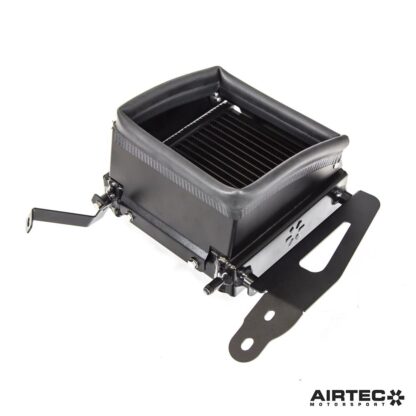oil temperatures reached 123 degrees. We needed to address the car's entire cooling system if we were going continue to modify and track our Yaris.The solutionDeveloped in-house at AIRTEC HQ in the UK we designed a series of new products to address the cooling issues when pushed to the limit. This additional radiator fits neatly behind the fog light (requires removal) and utilises laser-cut aluminium ducting to force cold air through the radiator. To create a flow path and further improve cooling