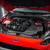 we recommend removing the upper radiator shroud located behind the front bumper and opening up the passenger side slam panel air feed. 