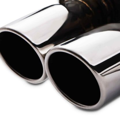Twin polished tailpipes designed to fit the OEM rear valance
