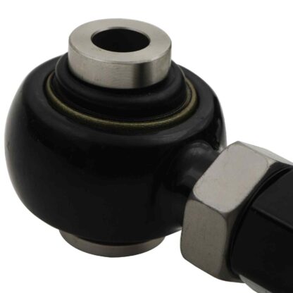 Spherical bearing mounted inner pivot points rather than bushes to reduce static friction and improve suspension performance