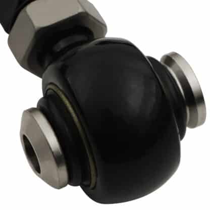 Spherical bearing mounted inner pivot points rather than bushes to reduce static friction and improve suspension performance