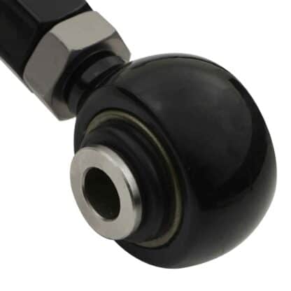 Spherical bearing mounted inner pivot points rather than bushes to reduce static friction and improve suspension performance