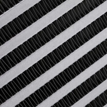 Durable bar-and-plate core for superior durability and performance
