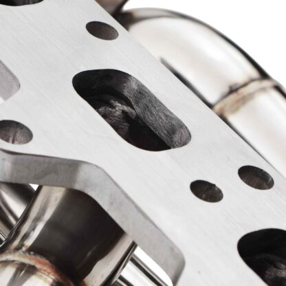 Removes the restrictive catalytic converter to improve gas flow through the entire system