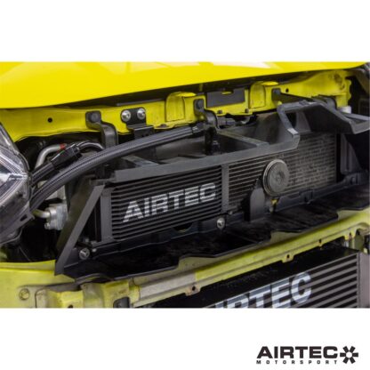 external oil cooler neatly behind the grille with the limited space available. As a result