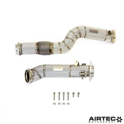 By removing the restrictive primary catalytic converters located in the original downpipes