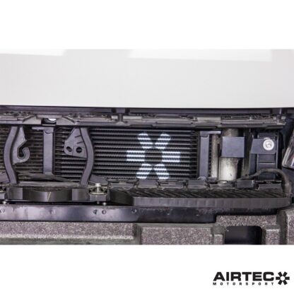 external oil cooler neatly behind the grille with the limited space available. As a result