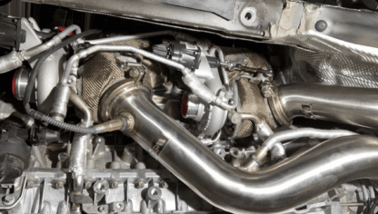 the turbos sit very close to power steering components