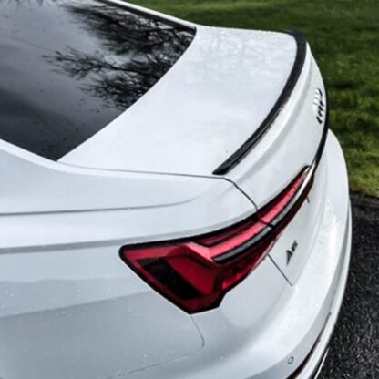 Add style and aerodynamic performance with a Gravity Performance rear spoiler. Transform the look and profile of your car