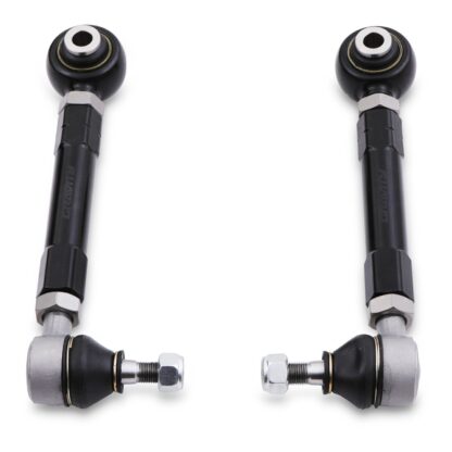 Spherical bearing mounted inner pivot points rather than bushes to reduce static friction and improve suspension performance