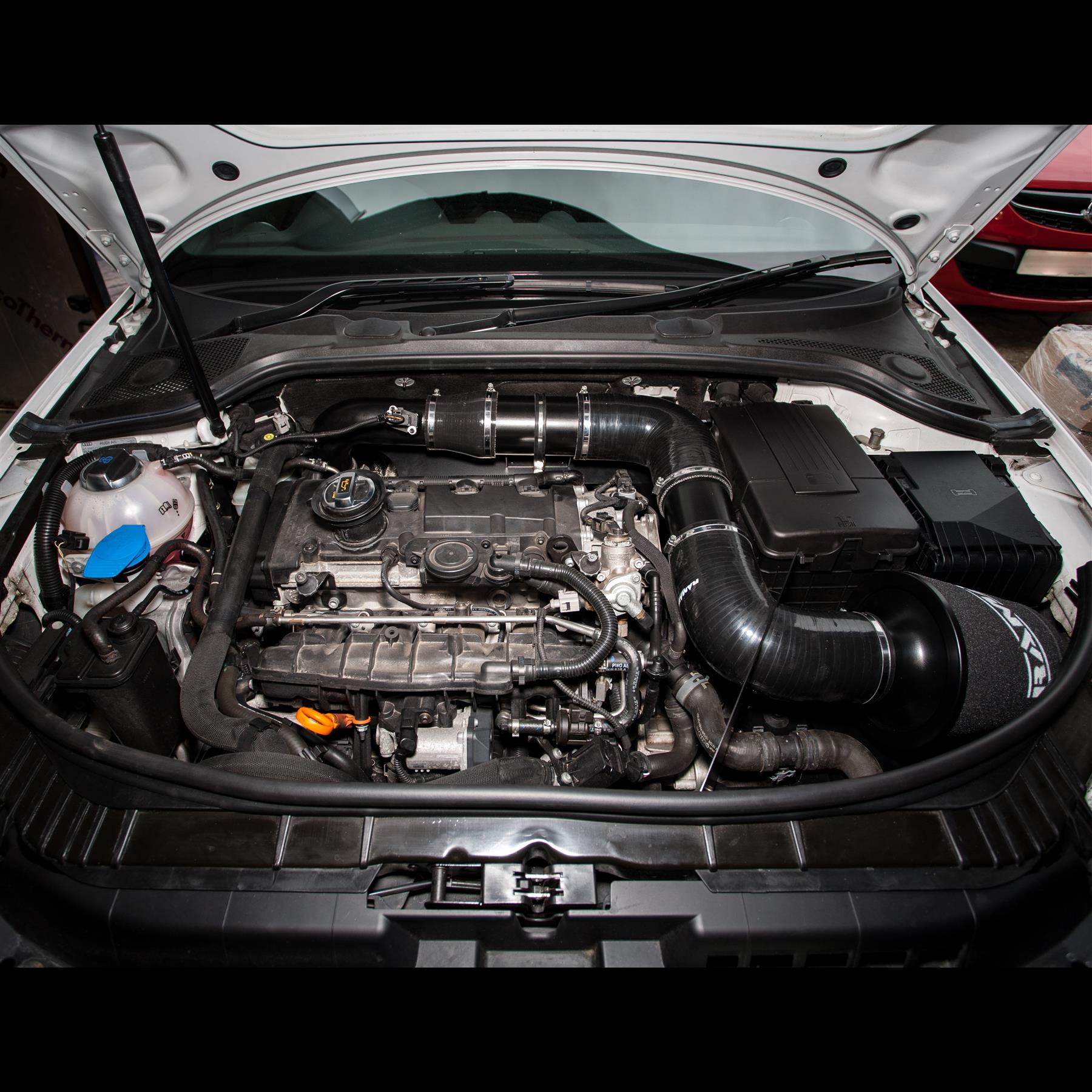 This Performance oversized intake kit with black silicone intake pipe is designed to fit Audi