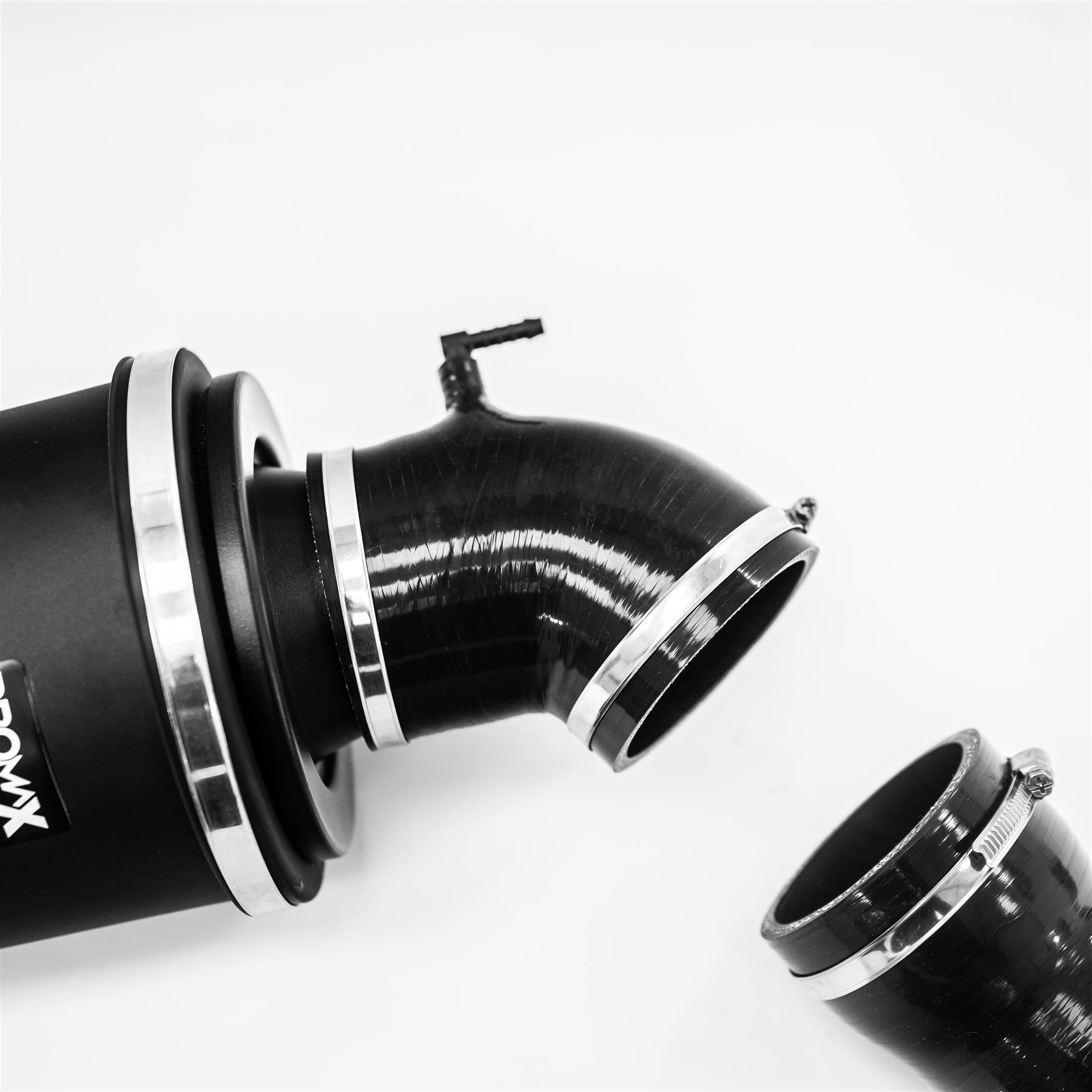 The ProMax enclosed filter has a modular design. Supplied with a bell mouth inlet and base adapter the housing can be combined with a foam Ramair or a pleated Proram filter. The aluminium enclosure shields against engine temps whilst the bell mouth is positioned for an increased cold air feed resulting in an added performance boost. This kit also includes custom silicone hoses from filter to turbo to increase performance and overall design aesthetics. The added hoses help create a more direct