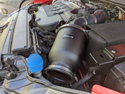 The ProMax enclosed filter has a modular design. Supplied with a bell mouth inlet and base adapter the housing can be combined with a foam Ramair or a pleated Proram filter. The aluminium enclosure shields against engine temps whilst the bell mouth is positioned for an increased cold air feed resulting in an added performance boost. This kit also includes custom silicone hoses from filter to turbo to increase performance and overall design aesthetics. The added hoses help create a more direct