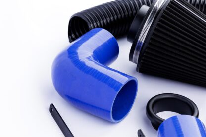 This is a performance induction kit for the 3.2L VW Golf MK5 R32