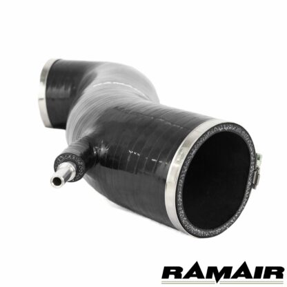 The Ramair Silicone Intake Pipe (part no. RIP-180) has been designed to replace the standard OEM plastic induction hose on the Ford Fiesta ST 180. The hose is constructed to provide a constant radius reducing restriction in the initial stage of the intake tract. The hose is supplied with high quality Stainless Steel W2 hose clamps and Billet CNC machined adapter to allow connection of the standard breather pipe in the standard factory position. The hose is made from high-quality mutli-ply silicone with fabric mesh reinforcement. It is available in Black