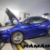 The Ramair Silicone Intake Pipe (part no. RIP-180) has been designed to replace the standard OEM plastic induction hose on the Ford Fiesta ST 180. The hose is constructed to provide a constant radius reducing restriction in the initial stage of the intake tract. The hose is supplied with high quality Stainless Steel W2 hose clamps and Billet CNC machined adapter to allow connection of the standard breather pipe in the standard factory position. The hose is made from high-quality mutli-ply silicone with fabric mesh reinforcement. It is available in Black