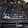 we retained all the stock provisions for sensors and mounting points. The sleek black finish seamlessly blends into the engine bay