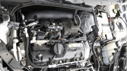 we retained all the stock provisions for sensors and mounting points. The sleek black finish seamlessly blends into the engine bay