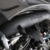 we retained all the stock provisions for sensors and mounting points. The sleek black finish seamlessly blends into the engine bay