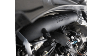 we retained all the stock provisions for sensors and mounting points. The sleek black finish seamlessly blends into the engine bay