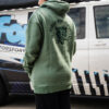this hoodie not only offers unmatched comfort but also embodies the fierce determination of those who aren't afraid to get their hands dirty. The deep green colour is a nod to classic racing heritage