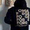 this hoodie not only offers unmatched comfort but with the off-white colour of the print on the black material it embodies the fierce determination of those who aren't afraid to get their hands dirty. </p>