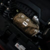 <strong>reducing the engine bay temperatures </strong>so that surrounding components will be less effected. This includes anything from coolant and electrical components to the general air temperature that can benefit induction.</p>