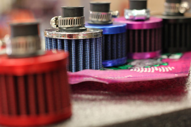 preventing foreign objects from entering the line and allowing airflow through the crankcase