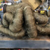 reaching temperatures up to 1200 degrees in extreme cases. A hot manifold and exhaust system can harm engine performance by raising the intake air temperature. Engines perform best at optimal temperatures; cooler intake temperatures produce better performance and more power.